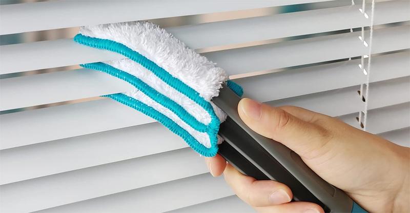 Clean window blinds in Dubai home