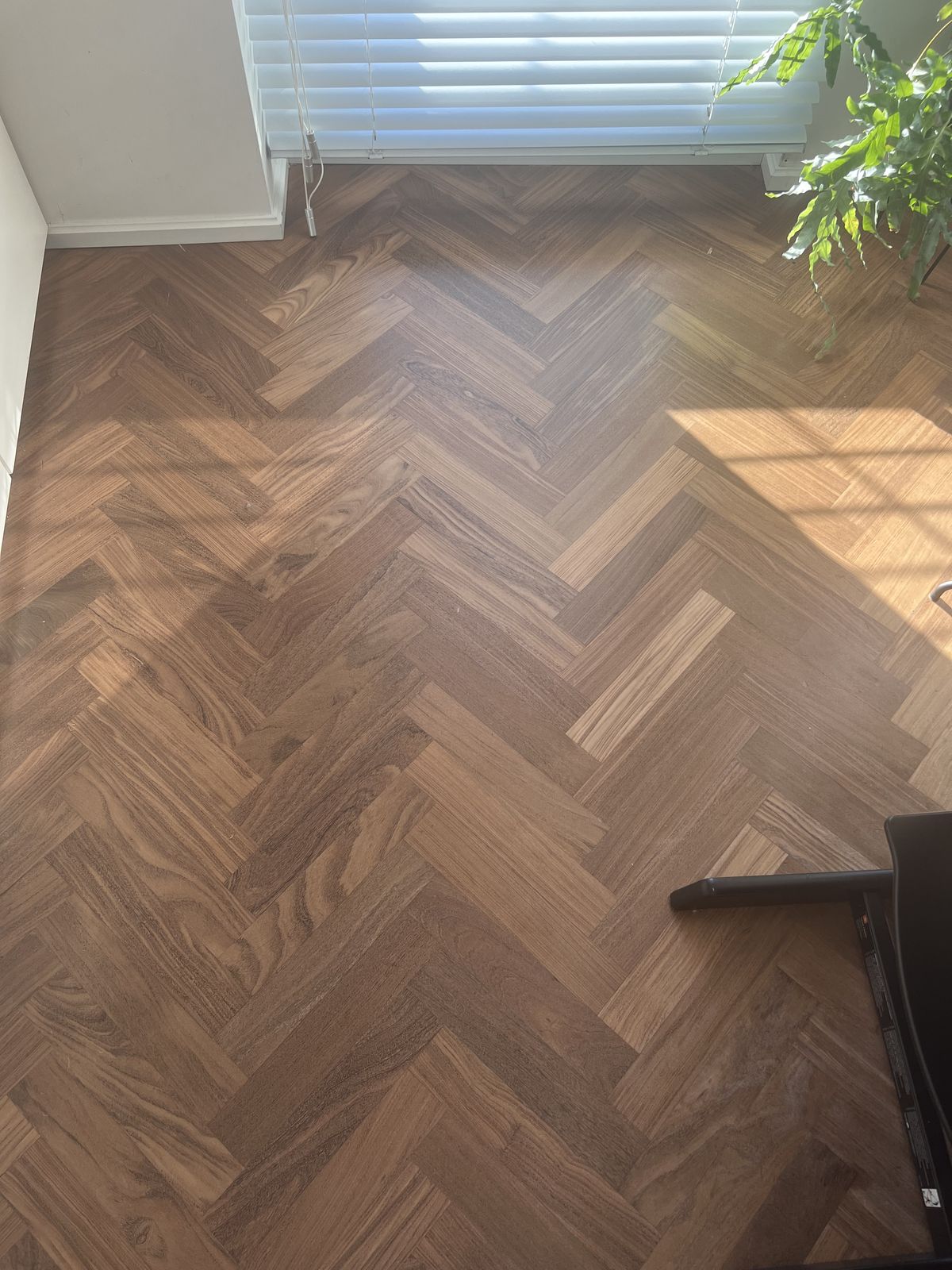 Herringbone parquet flooring pattern in Dubai villa