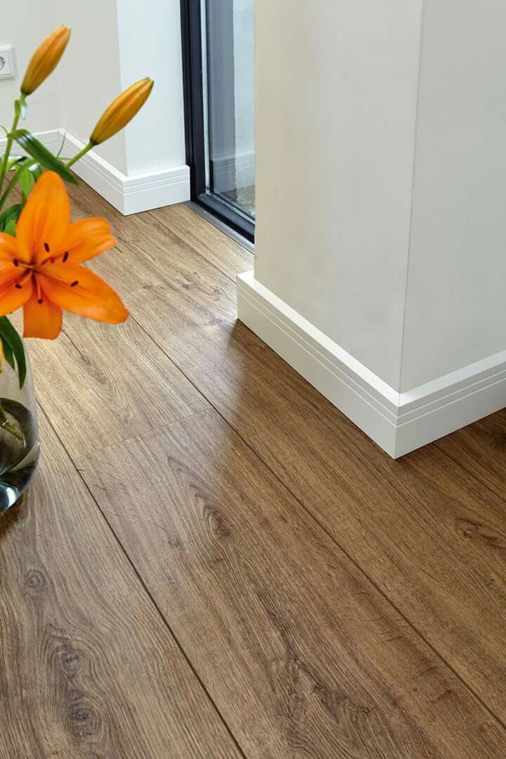 SPC waterproof flooring in Dubai kitchen with spill